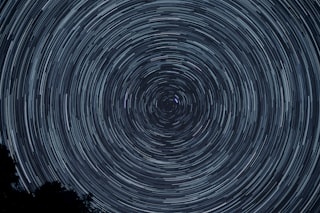 spiral gray and black digital wallpaper