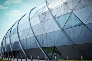 glass building under blue sky during daytime